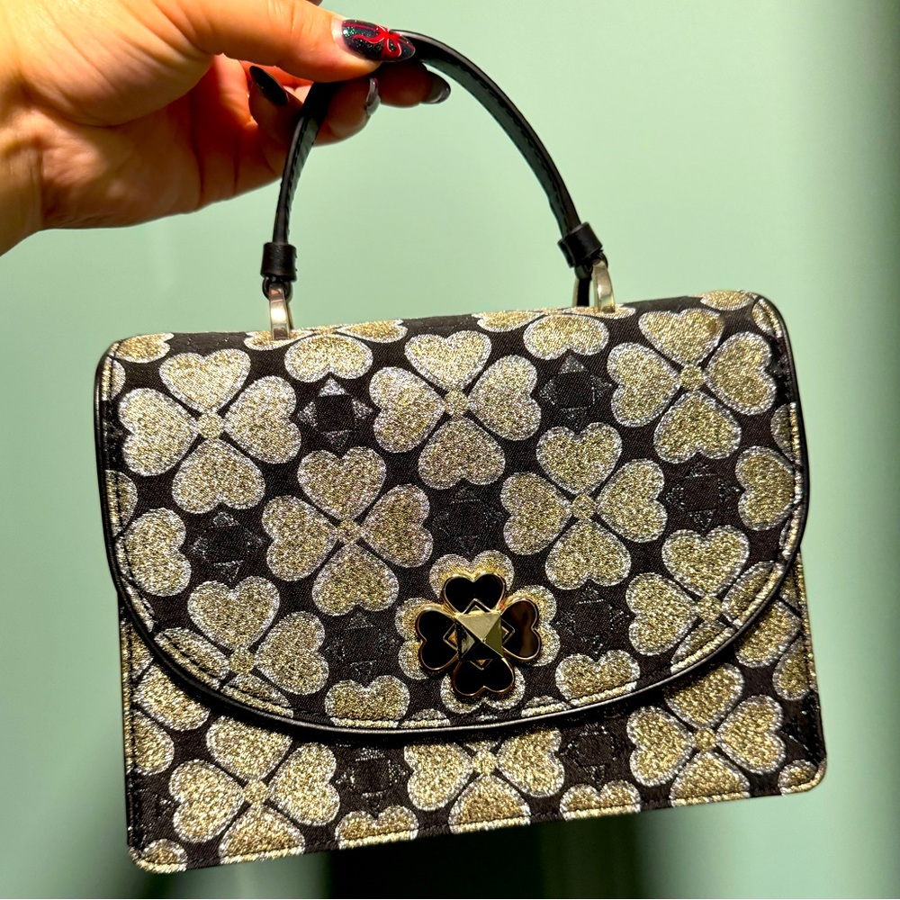 Kate Spade Odette top handle small jacquard monogram handbag twist lock
